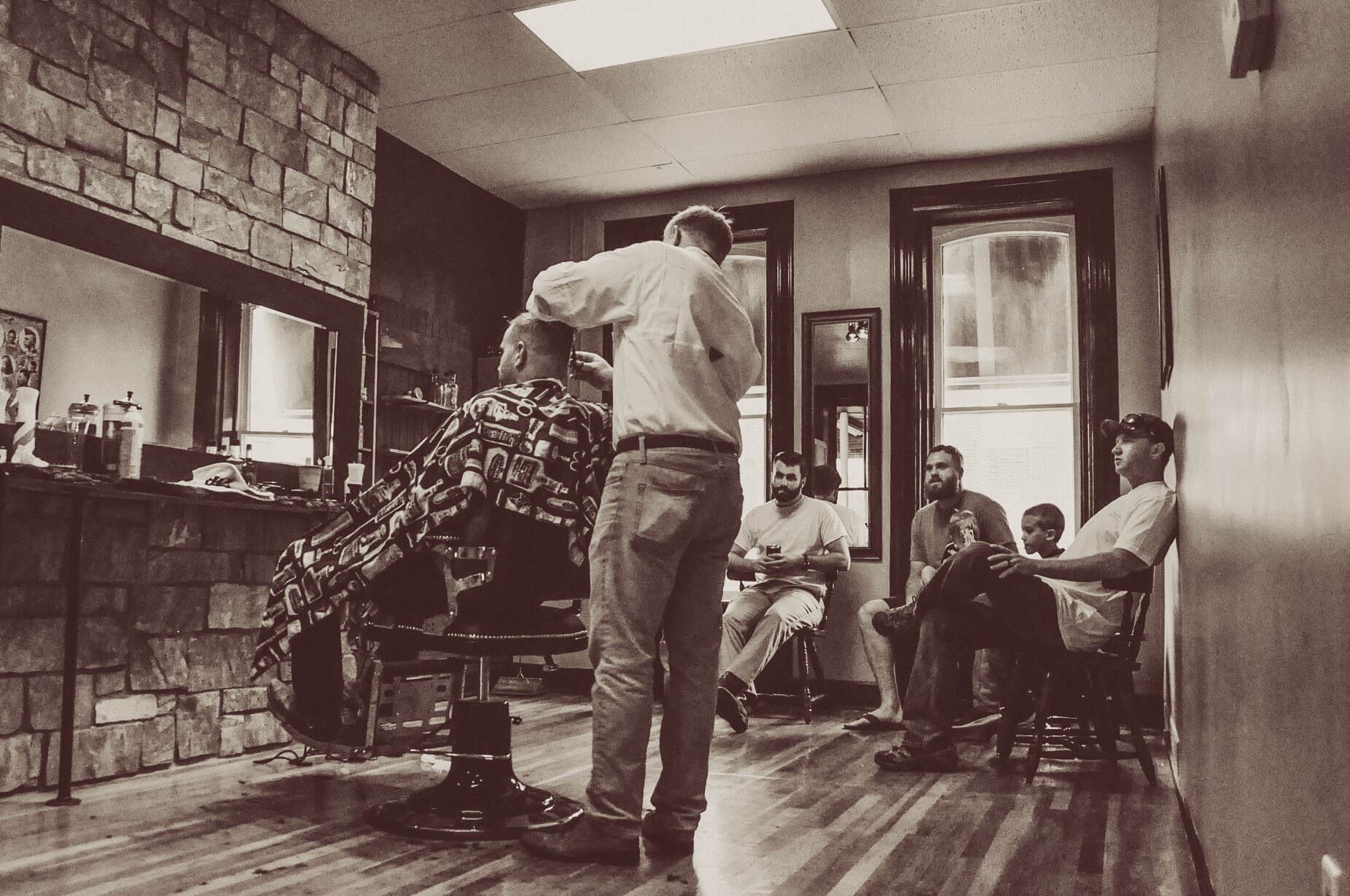 Barber In Room With People